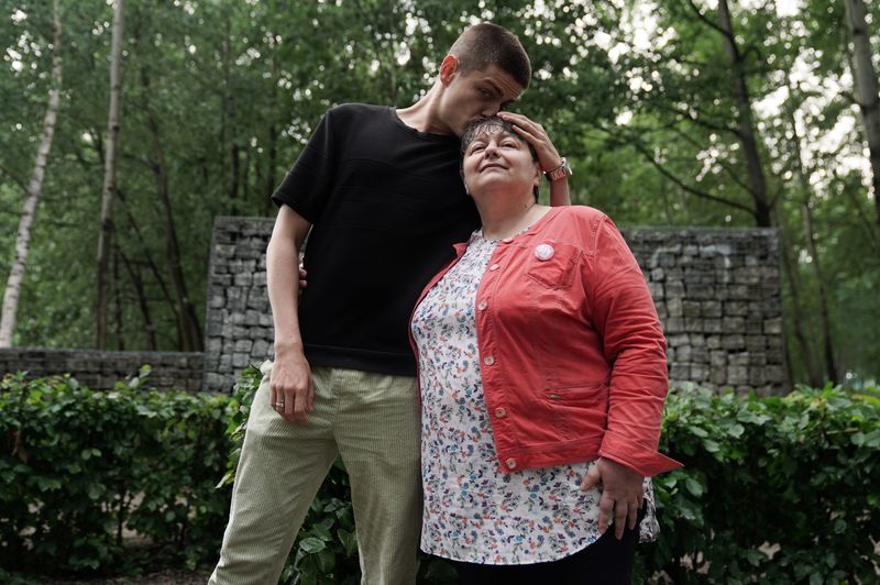 Marzenna Latawiec poses with her gay son Pawel Bednarek in