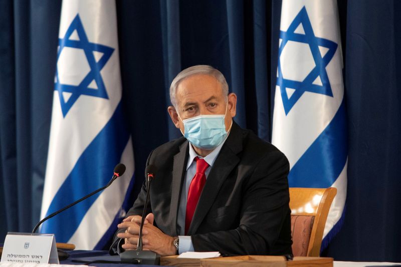 FILE PHOTO: Israeli Prime Minister Benjamin Netanyahu attends the weekly