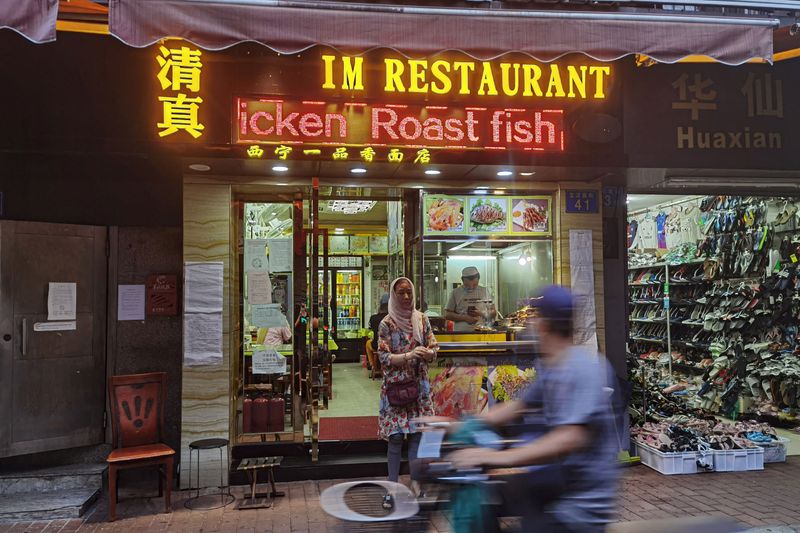 People eat at a halal restaurant in Guangzhou’s Xiaobei neighborhood