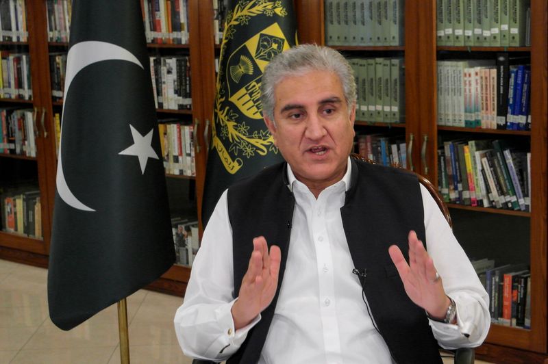 Pakistan’s Foreign Minister Shah Mehmood Qureshi gestures as he speaks