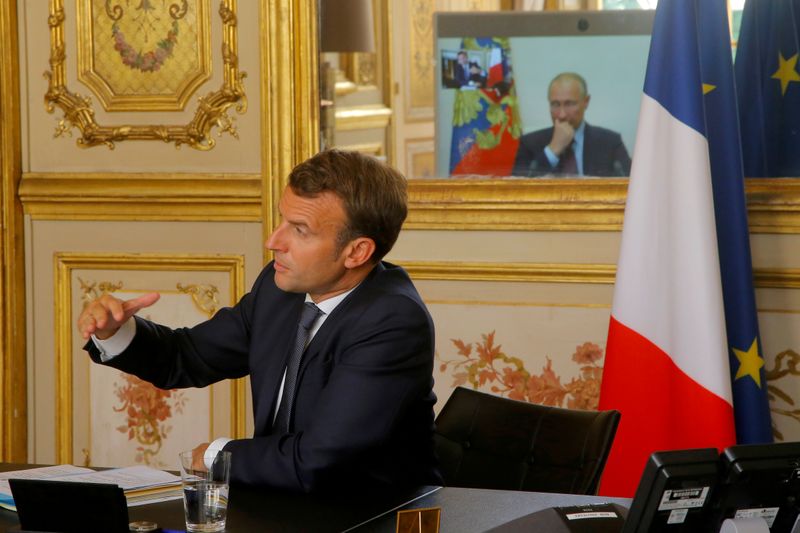 French President Emmanuel Macron holds a video meeting with Russian
