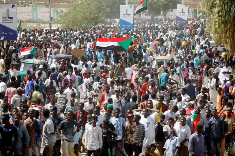 Civilians gather as members of Sudanese pro-democracy protest on the