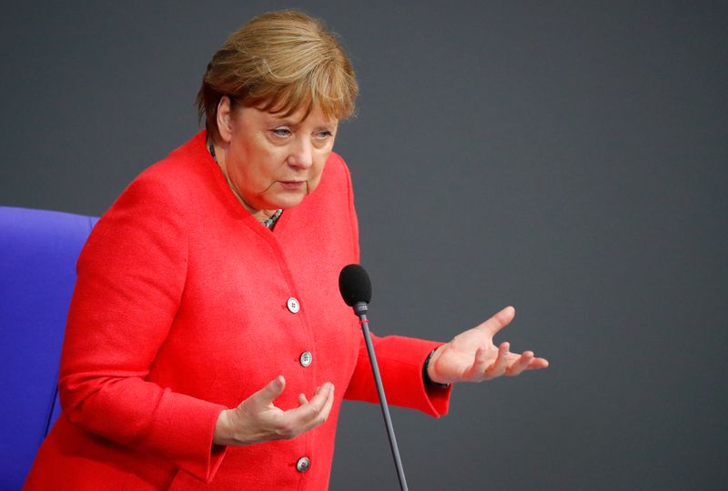 German Chancellor Angela Merkel attends a session of the lower