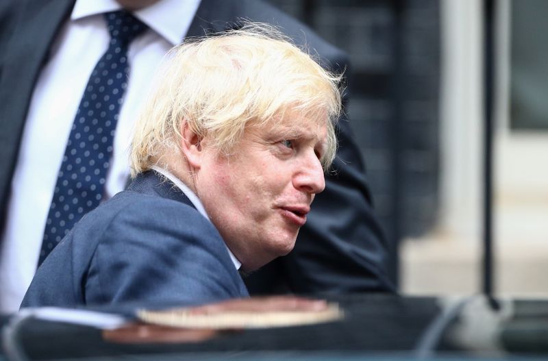 FILE PHOTO:  Britain’s Prime Minister Boris Johnson leaves Downing