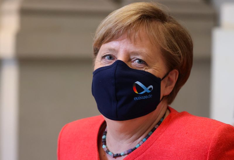 German Chancellor Angela Merkel wearing a face mask is seen