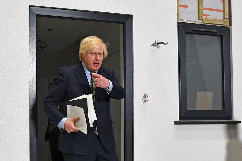 FILE PHOTO: Britain’s Prime Minister Boris Johnson Britain’s gestures after