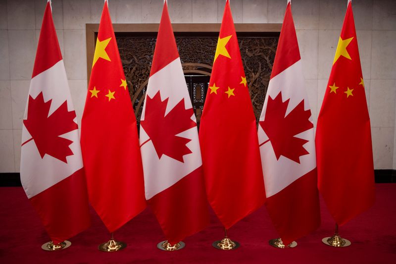 FILE PHOTO: Picture of Canadian and Chinese flags taken prior