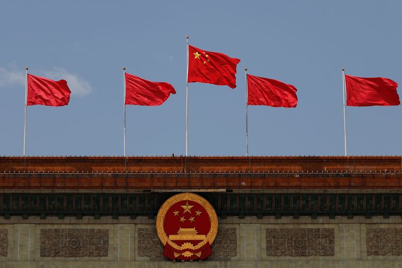 Chinese flag flutters at the Great Hall of the People