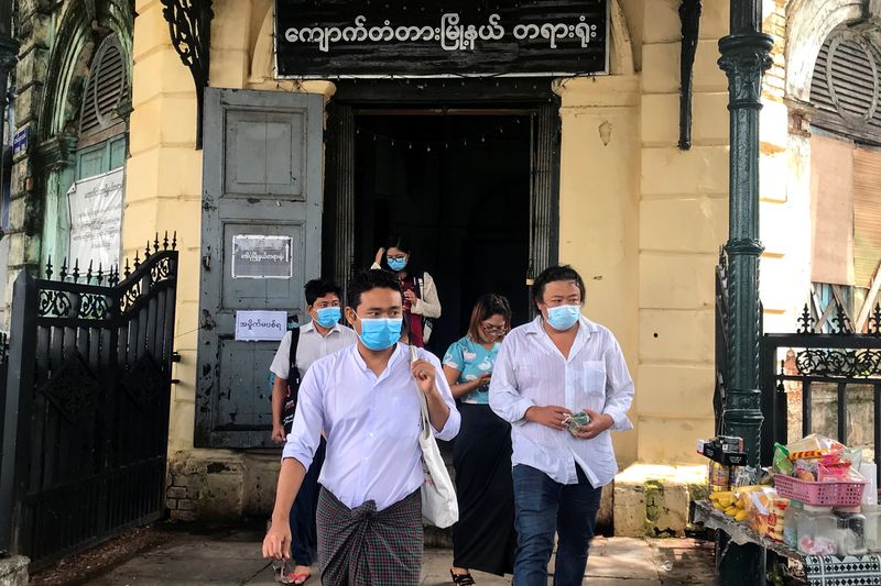 Youth activist Maung Saung Kha leaves at a court in