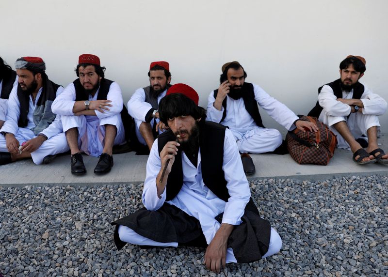 FILE PHOTO: Newly freed Taliban prisoners sit at Pul-i-Charkhi prison,