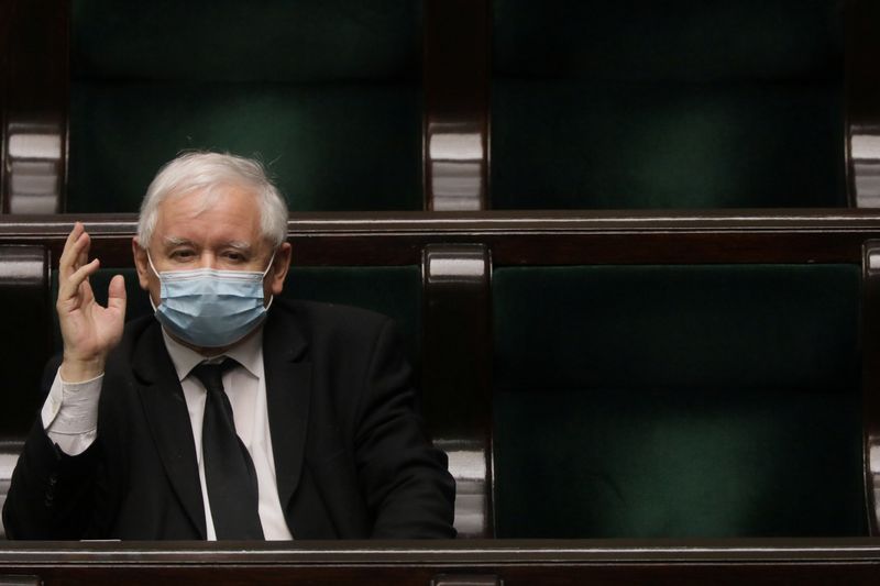 Law and Justice (PiS) leader Jaroslaw Kaczynski wears protective mask