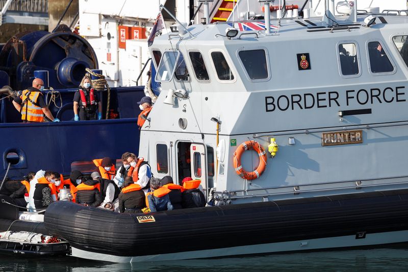 FILE PHOTO: A Border Force boat carrying migrants arrives at