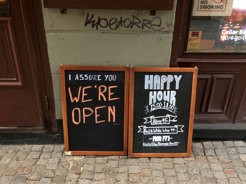 FILE PHOTO: Sign assures people that bar is open during