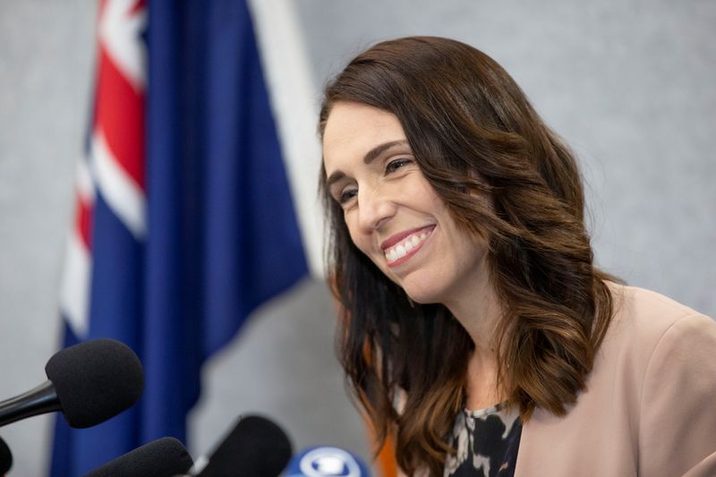New Zealand Prime Minister Jacinda Ardern smiles during a news