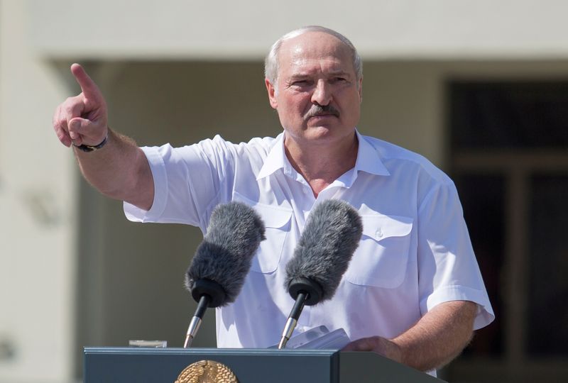 Belarusian President Lukashenko delivers a speech during a rally of