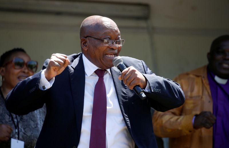 FILE PHOTO: Former South African President Jacob Zuma sings for