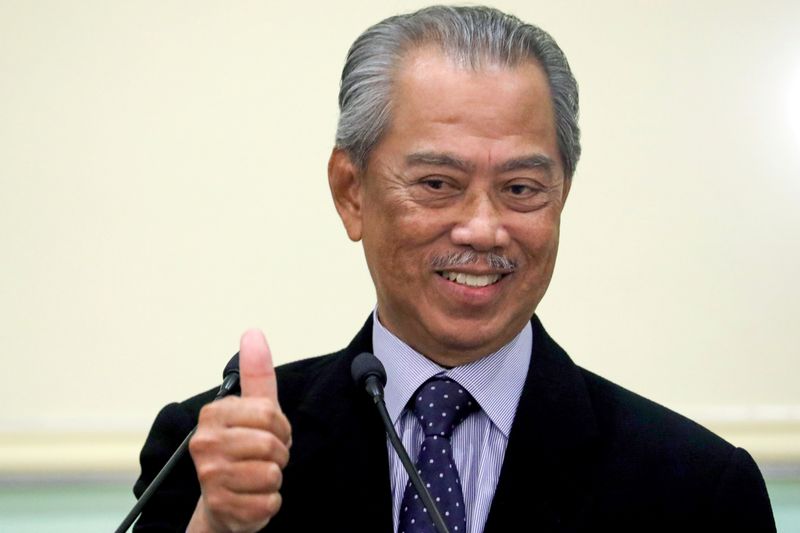 FILE PHOTO: Malaysia’s Prime Minister Muhyiddin Yassin gestures after his