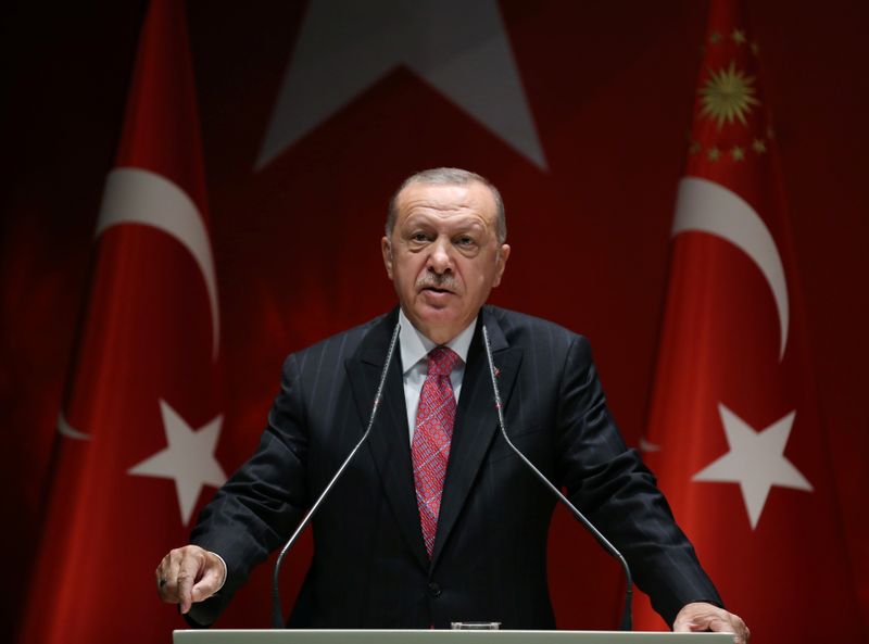 Turkish President Erdogan speaks during a meeting of his ruling