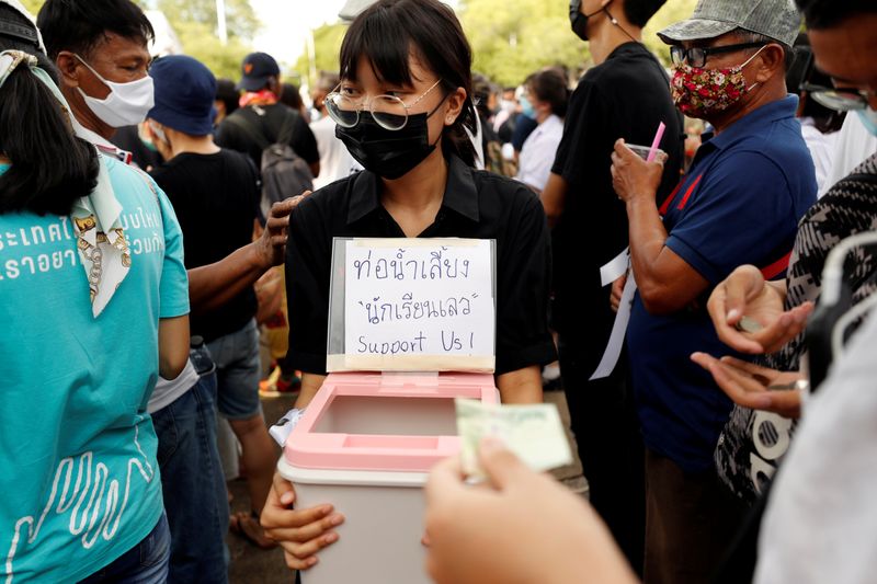 Anti-government protesters and students attend a demonstration in Bangkok
