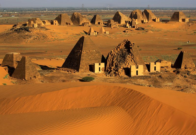 FILE PHOTO: Creeping desert sands surround the Royal Cemeteries of