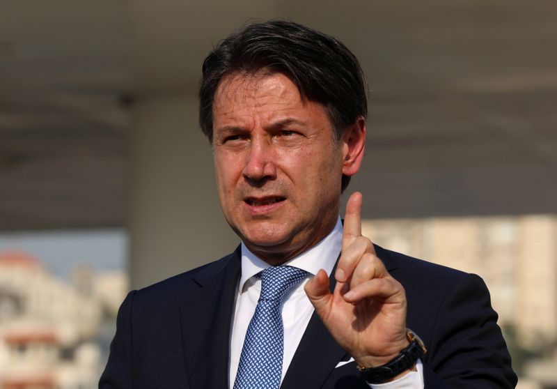 Italian Prime Minister Giuseppe Conte, gestures during a news conference