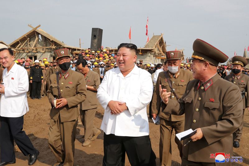 North Korea’s leader Kim Jong Un inspects a flood-hit site