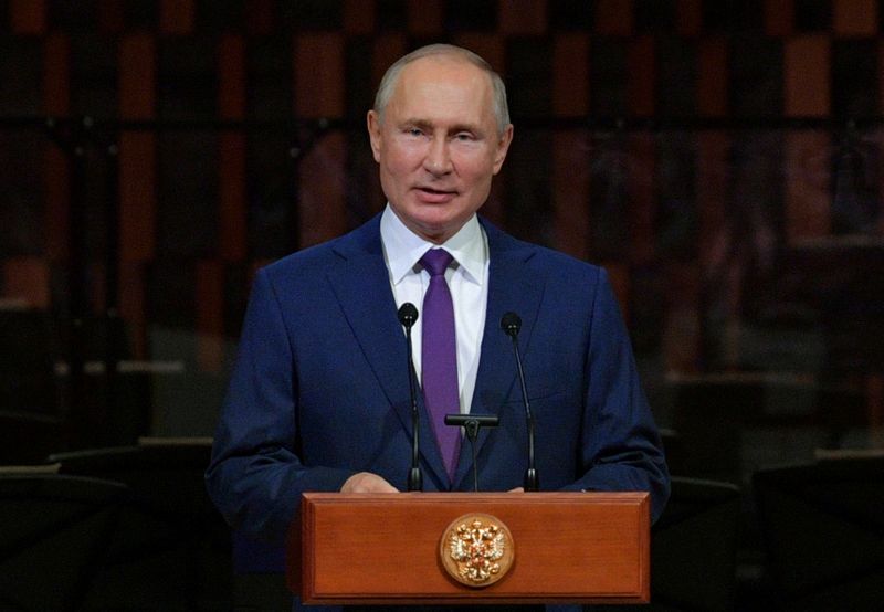 Russian President Vladimir Putin addresses the audience during Moscow City
