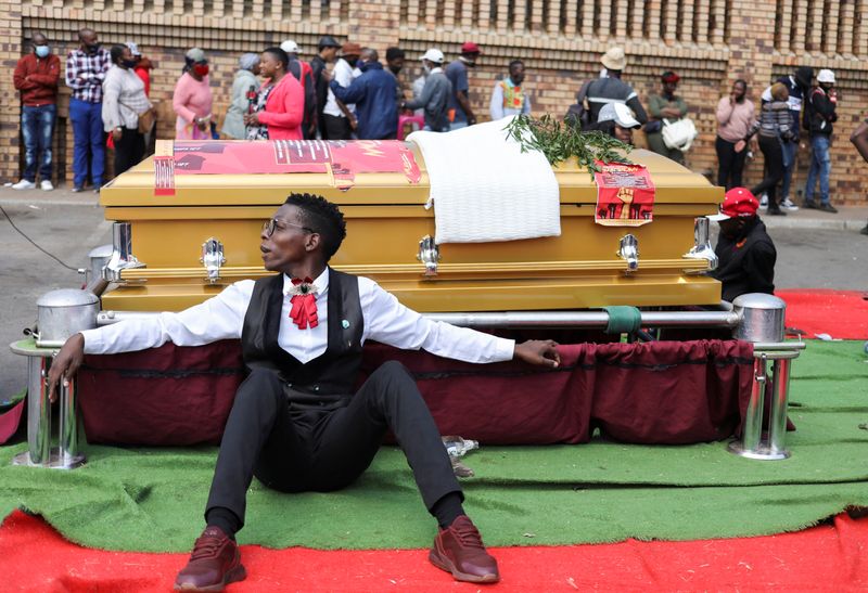 Striking funeral workers in South Africa down tools to demand