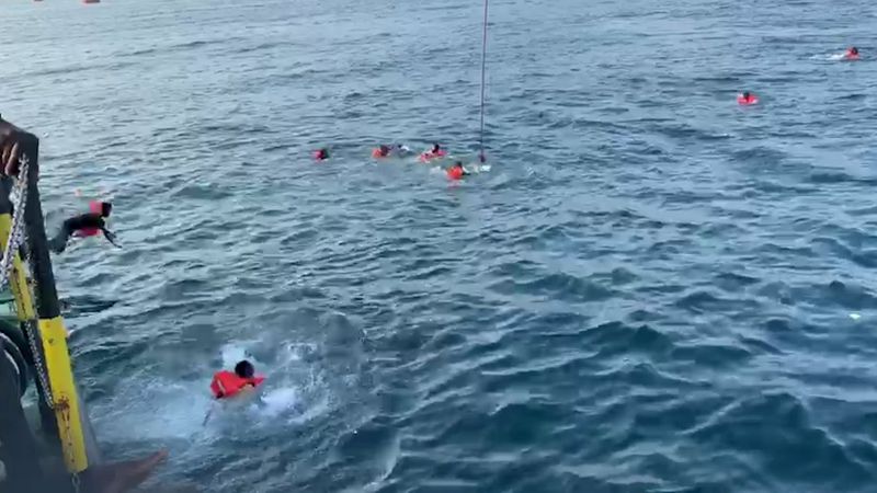 More desperate migrants jump overboard from charity boat off Italy