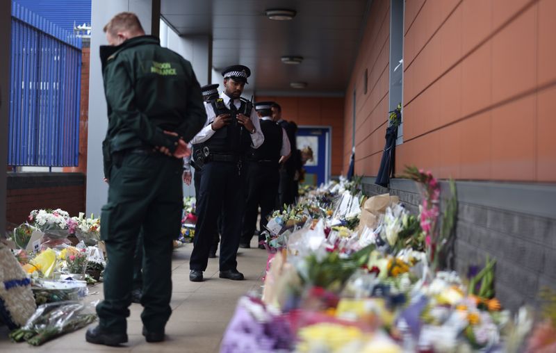British police officer shot dead at custody centre in south
