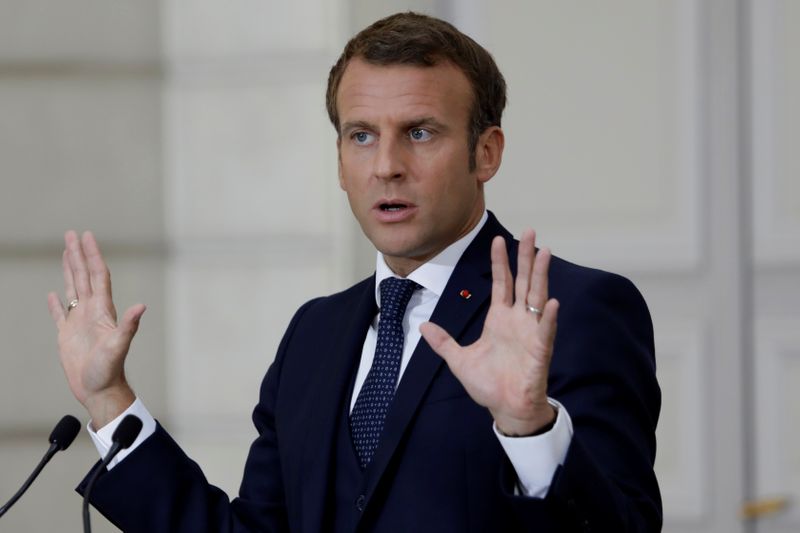 French President Emmanuel Macron holds a news conference on the