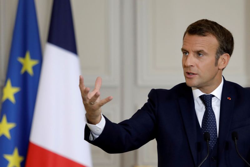 FILE PHOTO: French President Emmanuel Macron holds a news conference