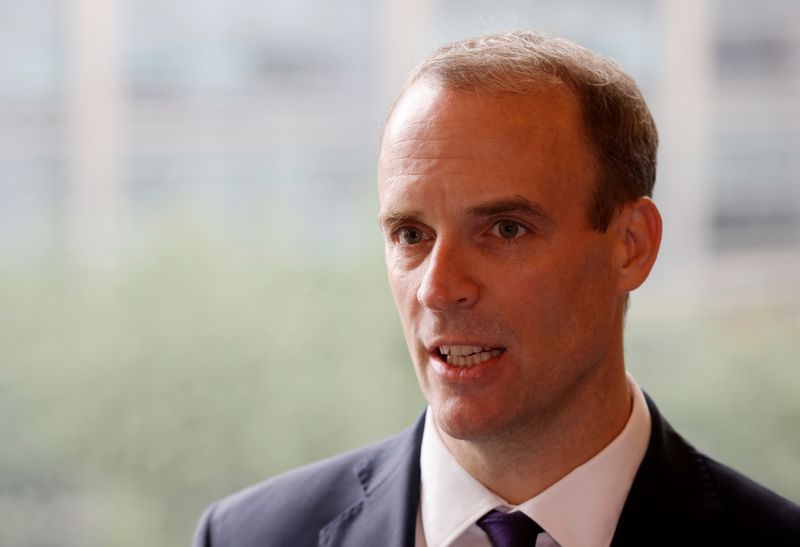 Britain’s Foreign Secretary Dominic Raab speaks during an interview with