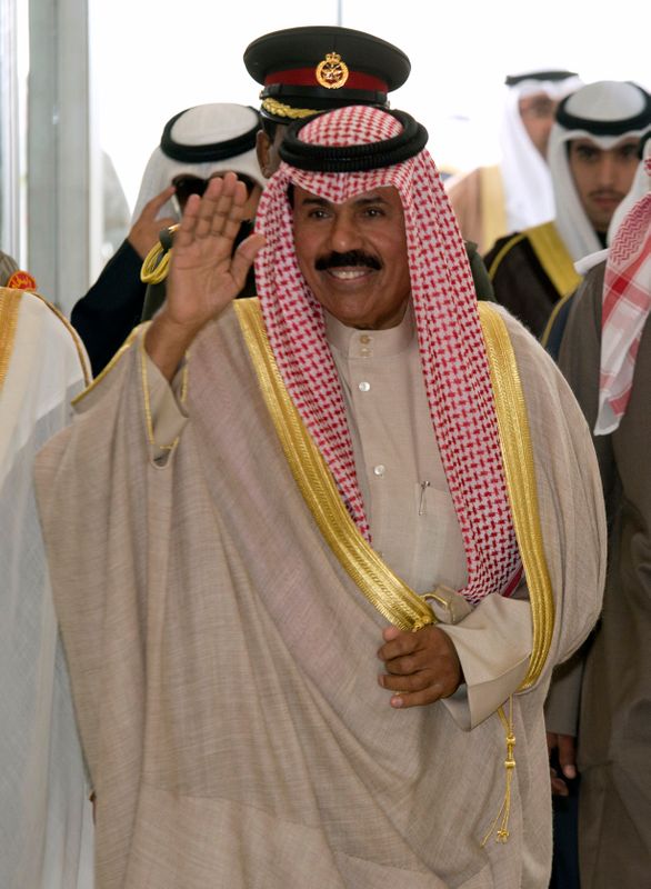 Kuwait’s Crown Prince Sheikh Nawaf al-Ahmad al-Sabah waves as he