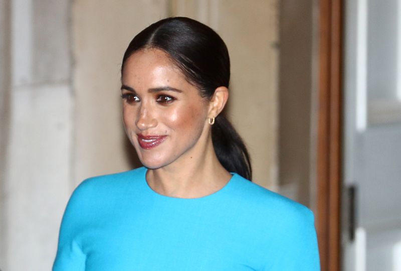 FILE PHOTO: Meghan, Duchess of Sussex, leaves after attending the