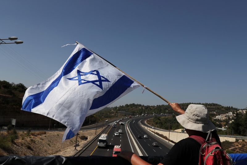 Israelis protest against legislation to limit demonstrations during COVID-19 lockdown