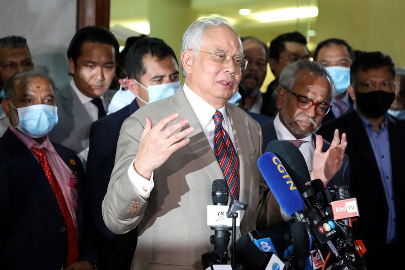 FILE PHOTO: Former Malaysian Prime Minister Najib Razak speaks during