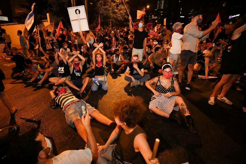FILE PHOTO: Israelis protest against law that limits protests during
