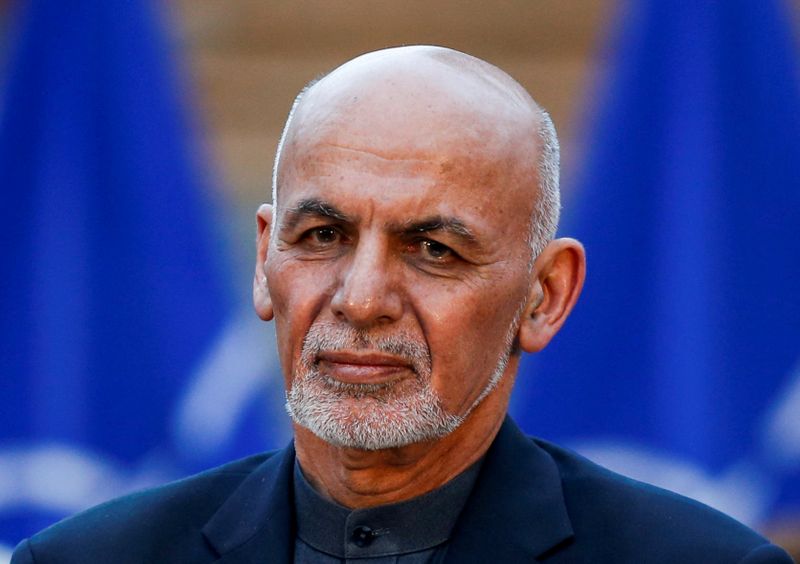 FILE PHOTO: Afghanistan’s President Ashraf Ghani, looks on during a