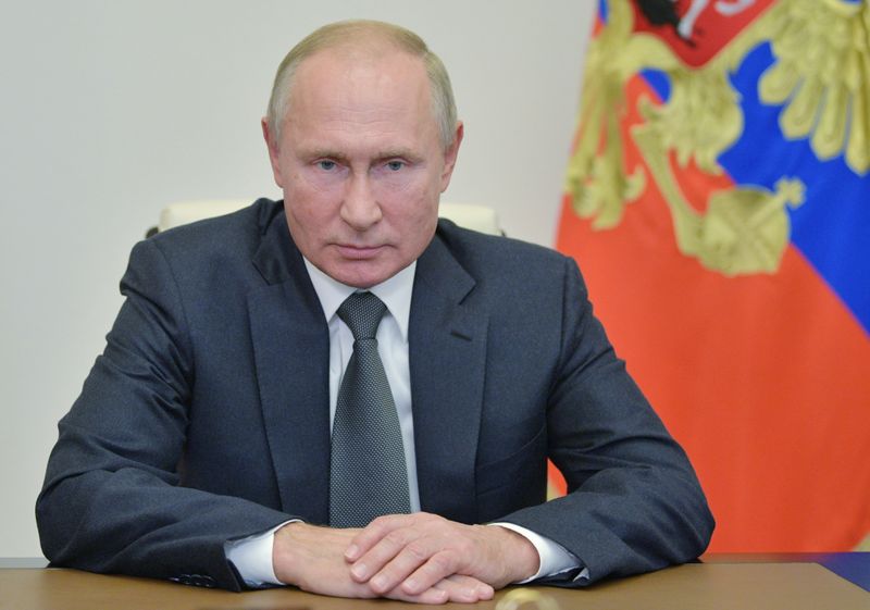 Russian President Putin meets with Chief of the Russian Armed