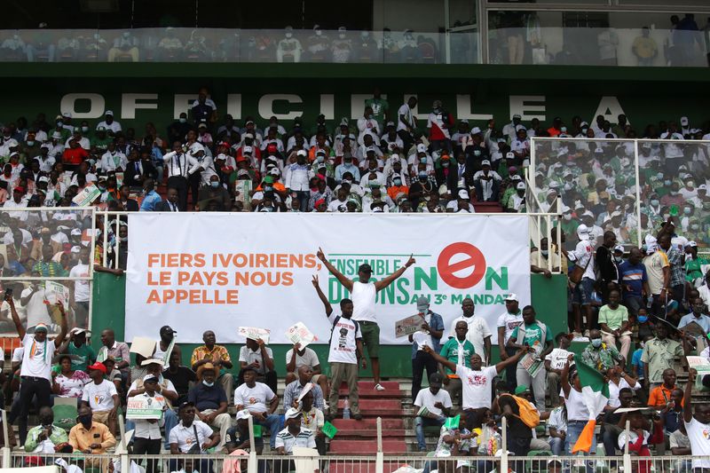 Supporters of Ivory Coast’s opposition coalition parties gather during a