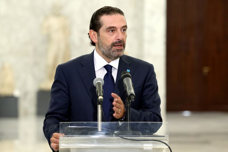 Former Prime Minister Saad al-Hariri speaks at the presidential palace