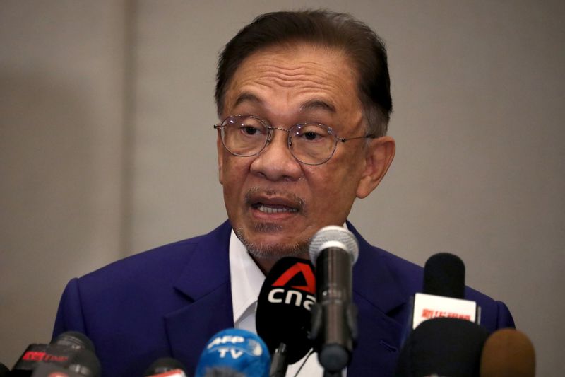 Malaysia opposition leader Anwar Ibrahim speaks during a news conference