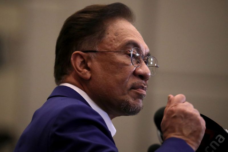 Malaysia opposition leader Anwar Ibrahim speaks during a news conference