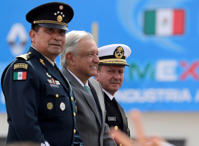 FILE PHOTO: Mexico’s President Obrador, Secretary of Defense Sandoval and