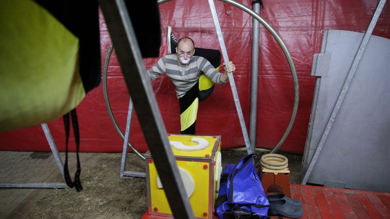 Artist warms up backstage ahead of his performance at Circus