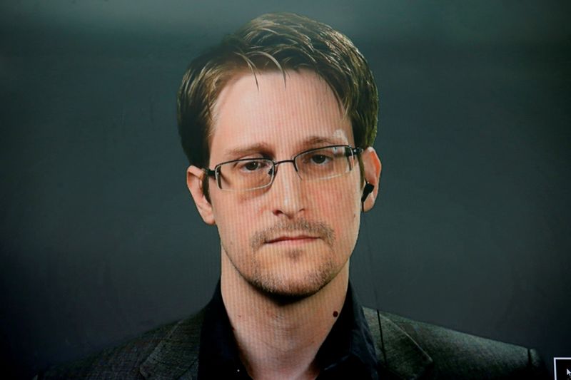 FILE PHOTO: Edward Snowden speaks via video link during a