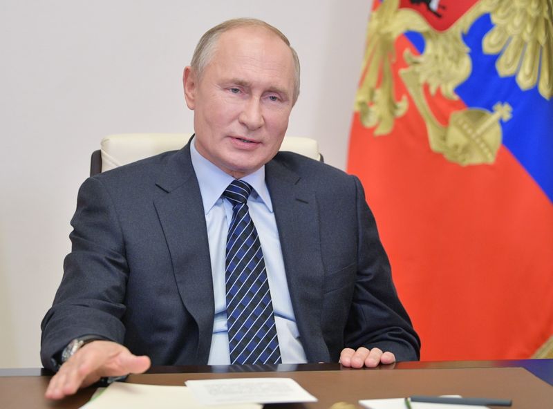 Russia’s President Putin addresses members of the Russian Union of