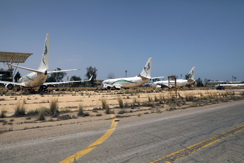 FILE PHOTO: Airplanes are seen at Tripoli airport after Libya’s