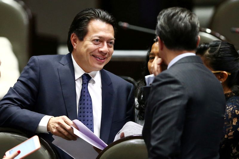 FILE PHOTO: Lawmaker Mario Delgado of the ruling Morena chats